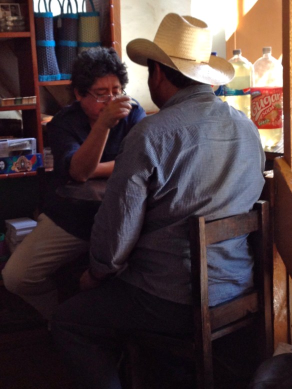 Ulisses tasting a local farmer's mezcal