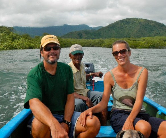 Domingo taking us up the river